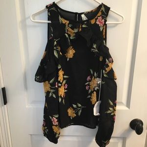 Long sleeved, open shoulder, light weight shirt